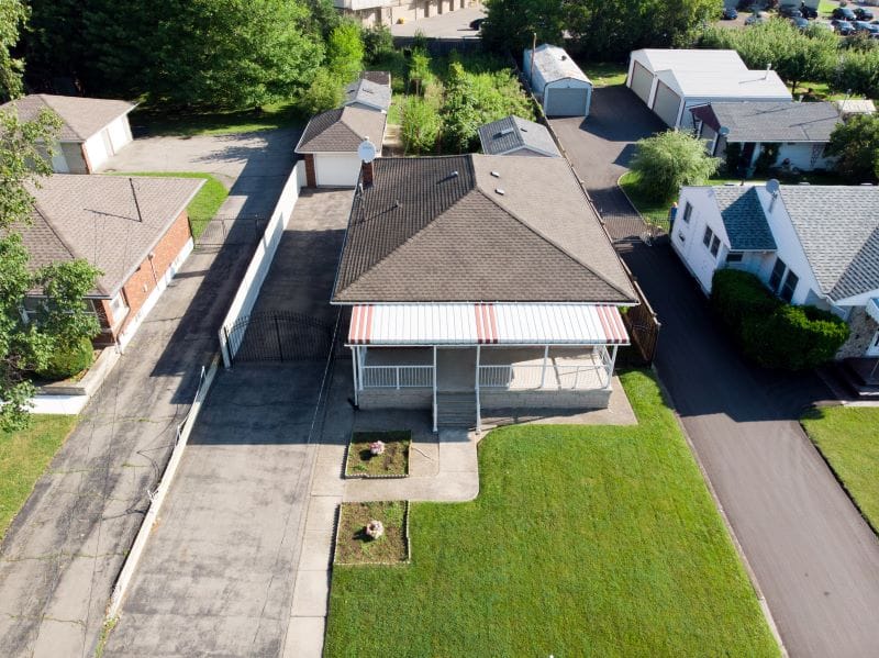 5 home fixes. Inspecting a home for fall. Aerial view of a detached home